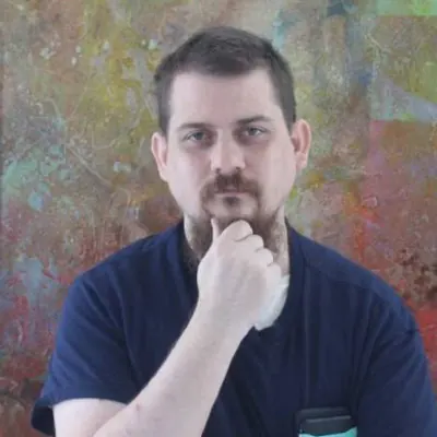 Luke Dashjr 手托下巴的正面肖像